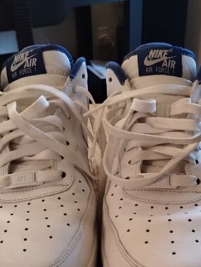 Nike Air Force One White Leather Sneakers with Navy Tongue Accents